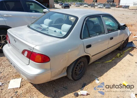 2000 Toyota Corolla Ce z USA, uszkodzony, nr VIN 1NXBR12E0YZ321923